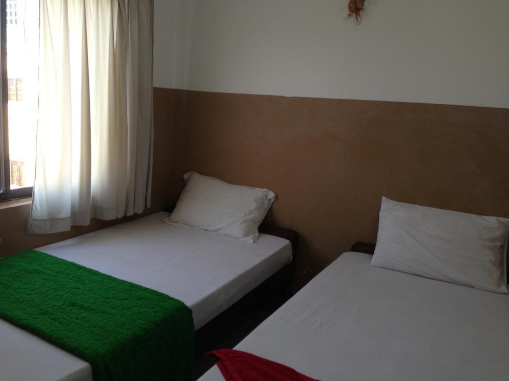 Grand View Guesthouse Phnom Penh Quarto foto